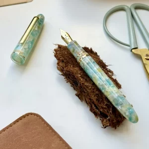ESTIE SEA GLASS / PALLADIUM TRIM ROLLERBALL